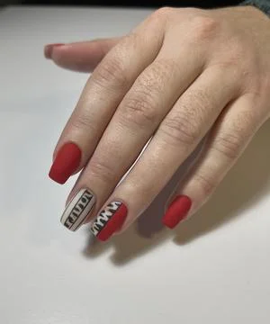 Matte Red Nails with Pattern Design Stock Photos