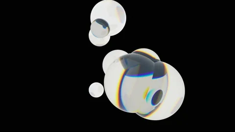 Matte white balls spin quickly against a dark background. Stock Footage 124607416