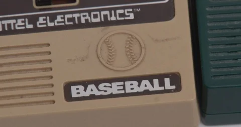 Mattel Electronics - Baseball Hand Held Game - Close Up Of Baseball Text Stock Footage 101811811