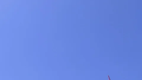 Matterhorn mountain with a pan down through flowers Stock Footage 114823546