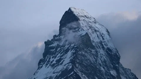 Matterhorn mountain summit with clouds unveiling the peak Vídeos de archivo 139032186