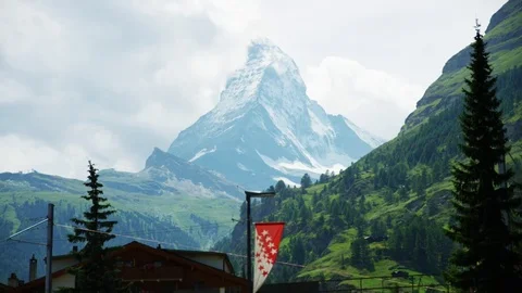 Matterhorn view with Valais flag in front - Shot on RED at 5K Stock Footage 79326880