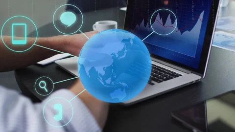 Mature analyst typing and gesturing on laptop, forming 3D globe and linking Stock Footage 335255281