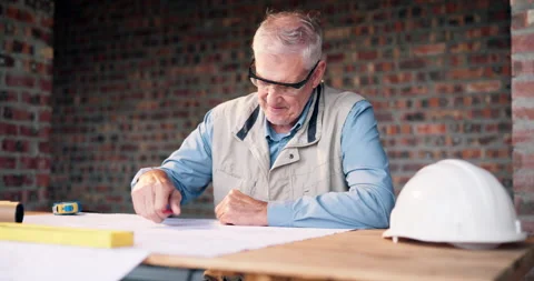 Mature, architect or happy man with blueprint on construction site for planning Stock Footage 337038690
