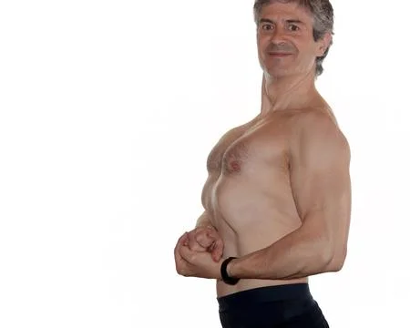 Mature bodybuilder posing side chest isolated on white background Foto stock