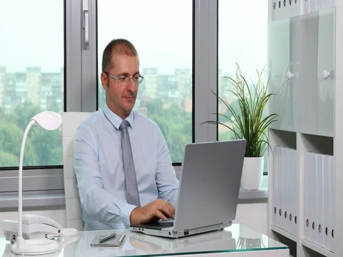Mature Business Man Typing on Computer Laptop Keyboard Busy Male Activity Office Stock Footage 73612860