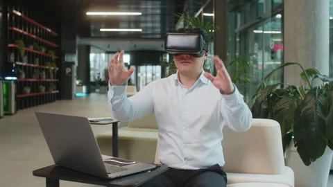 Mature businessman software developer using headset app making presentation in Stock Footage 315858208