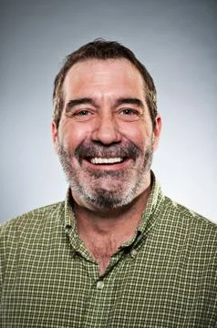 Mature caucasian man smiling portrait Stock Photos