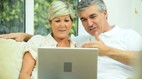 Mature Couple Using Online Video Chat Stock Footage 8688287