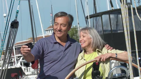 Mature Couple Using Smartphone Stock Footage 32023530