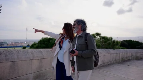 Mature couple walking while holding hands Stock Footage 270171072