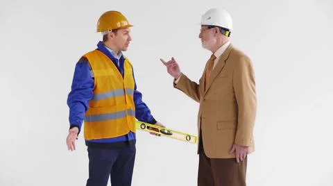 Mature developer and architect argue isolated on white background Stock Photos