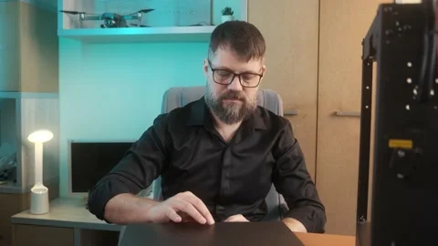 Mature developer serious man is using laptop typing in office Stock Footage 237078772