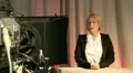Mature female presenter in television studio 1 HD Footage
