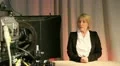 Mature female presenter in television studio 1 HD Footage