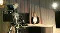 Mature female presenter in television studio 2 HD Footage