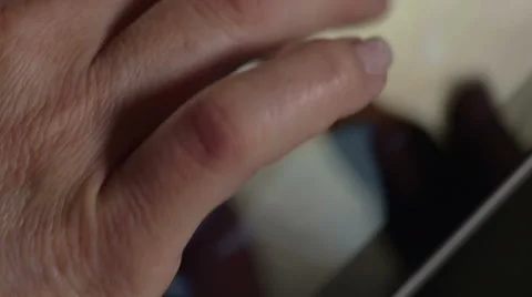 Mature hands use tablet screen Stock Footage 47989436