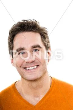 Mature handsome man blue eyes smiling portrait Stock Photos