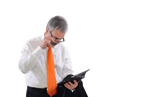 Mature  has difficulty reading Stock-Fotos