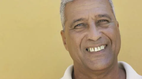 Mature hispanic man smiling at camera Video stock 7762113