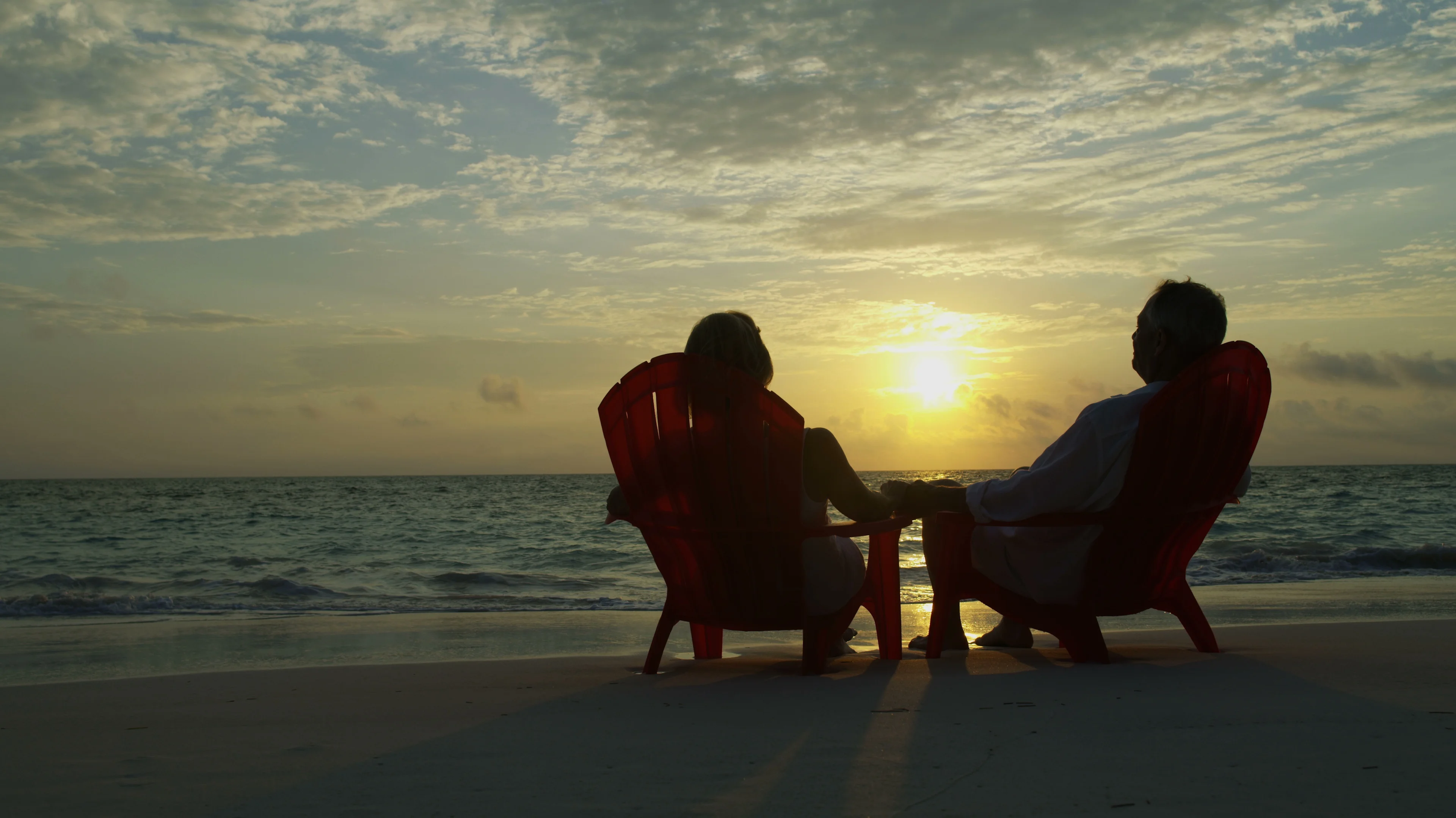 Mature husband wife relaxing outdoors leisure retirement living