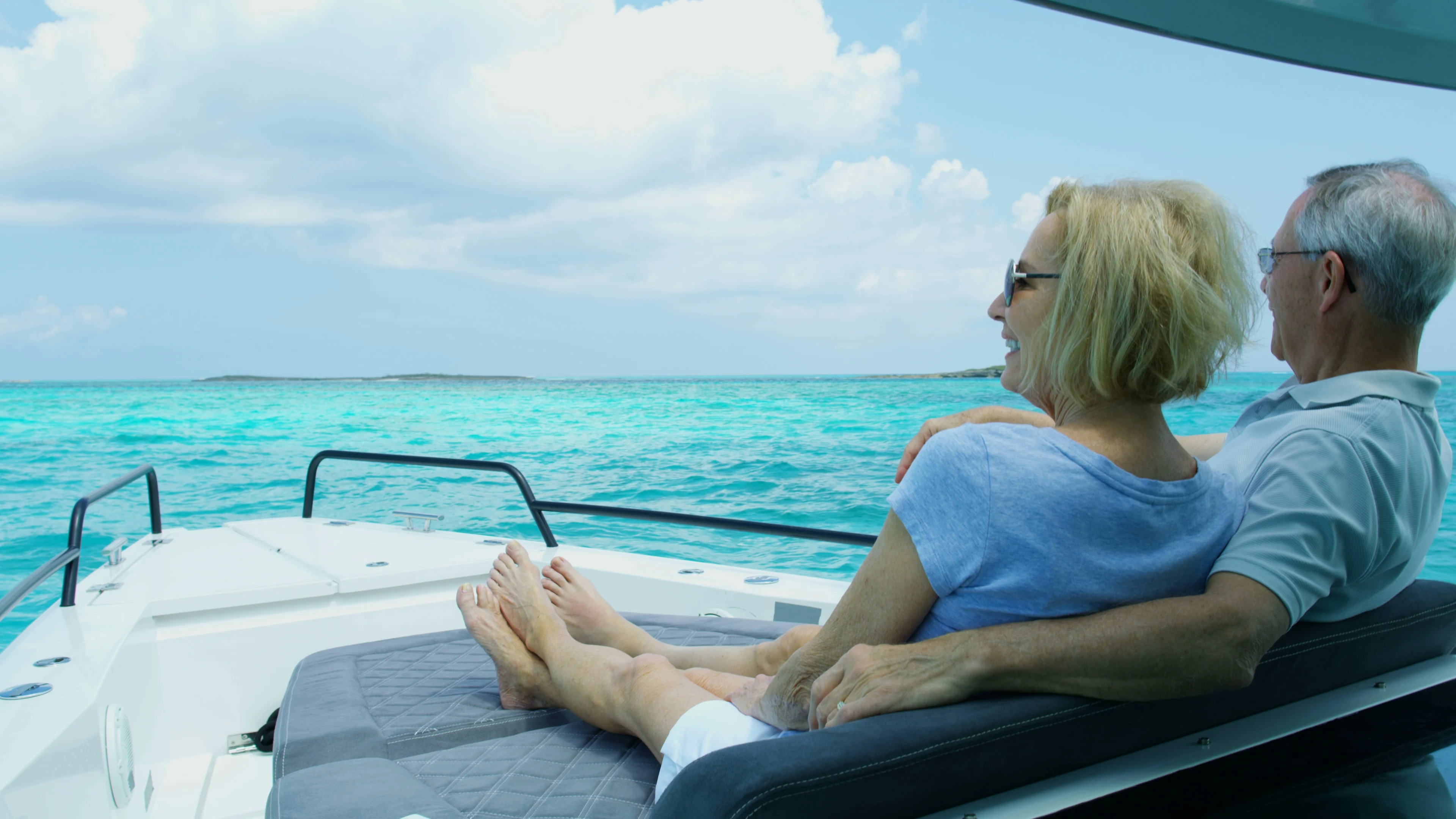 Mature husband wife retirement living outdoors sailing Bahamas