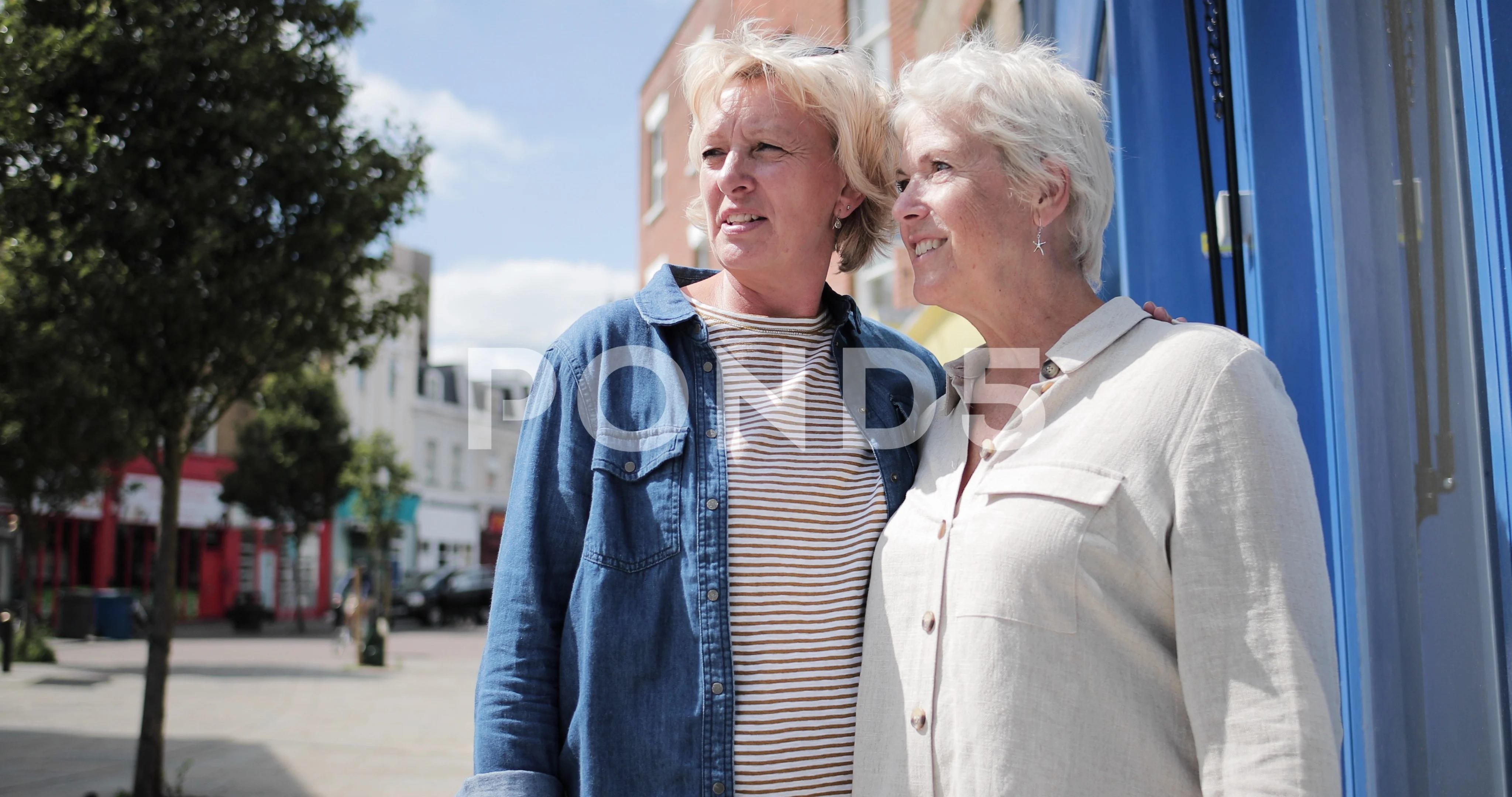 Mature lesbian couple on high street in ... | Stock Video | Pond5