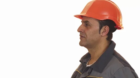 Mature male constrution worker posing with a drill machine Stock Footage 85974578