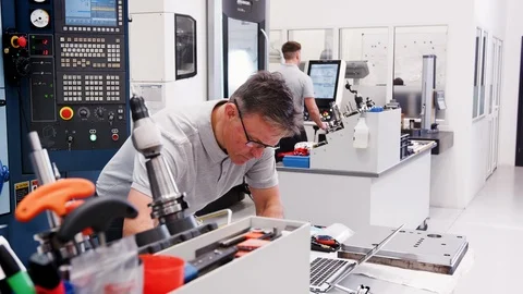 Mature Male Engineer Using CAD Programming Software On Laptop Stock Footage 95508926