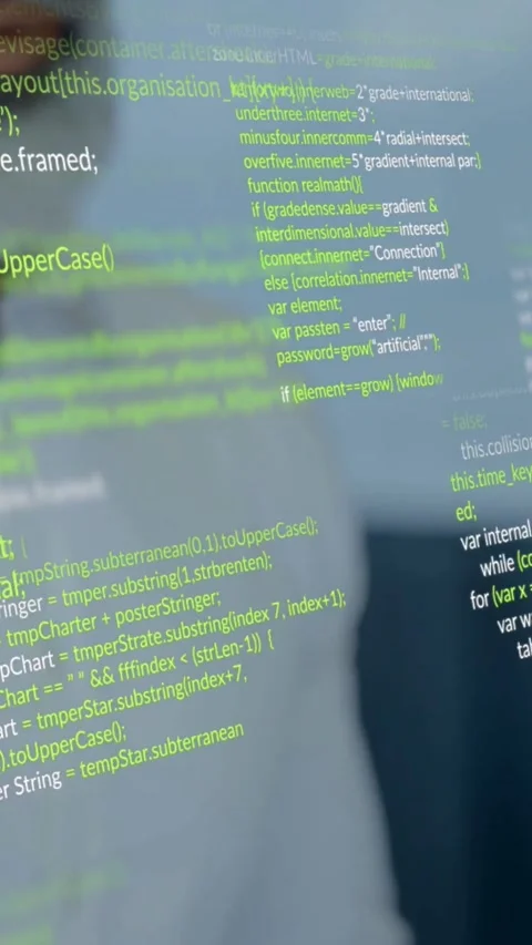 Mature male software developer flipping laptop lid and causing code overlay Stock Footage 334550537