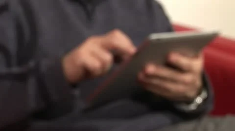 Mature male using computer tablet Video stock 21960438
