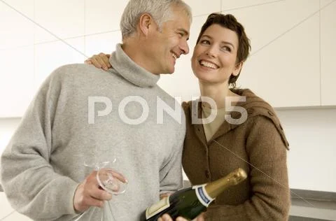 Mature Man And A Mid Adult Woman Smiling