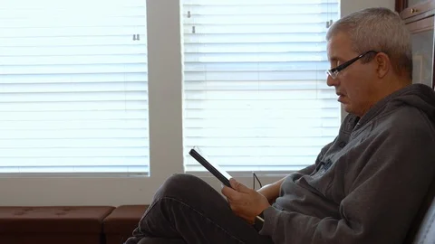 Mature Man And Tablet 動画素材 127222598