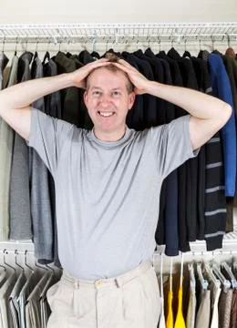 Mature man anger while dressing Stock Photos