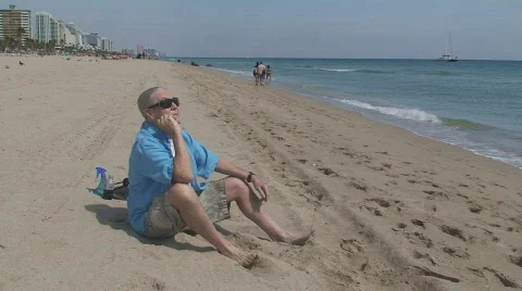 Mature man at the beach Stock Footage 658813