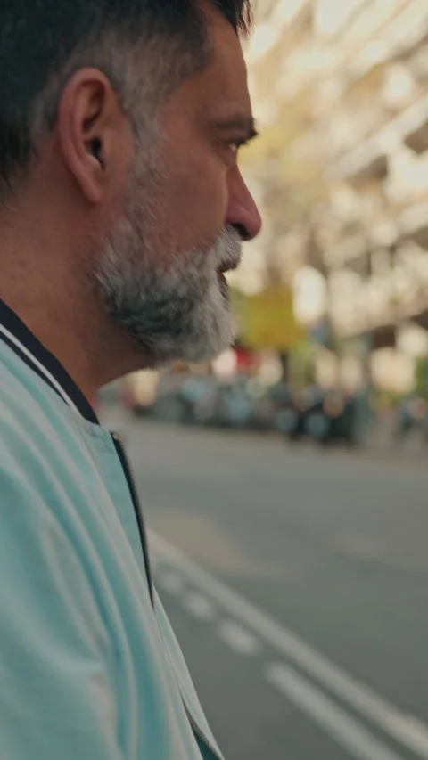 Mature Man With Beard Walking Down City Street Stock Footage 329933864