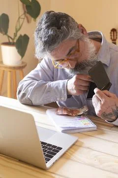 Mature man checking empty wallet having financial problems 스톡 사진