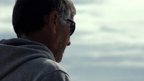 Mature man contemplates the view Stock Footage 71007774