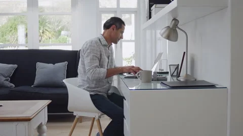 Mature man at desk Stock Footage 55654873