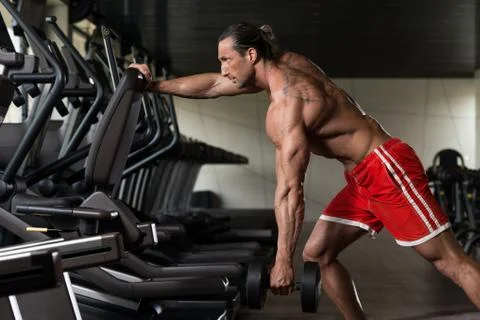 Mature Man Doing Exercise For Back Stock Photos