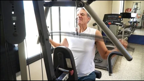 Mature Man Doing Lat Pull Downs Stock Footage 111733066