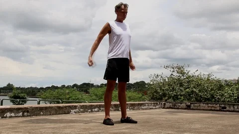 Mature Man Doing Squats Stock Footage 103230473