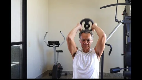 Mature Man Doing Triceps Extensions Video stock 111733071