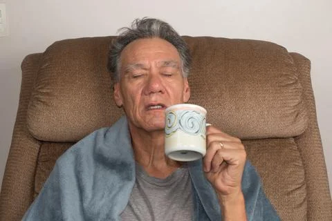 Mature Man Drinking Tea Stock Photos