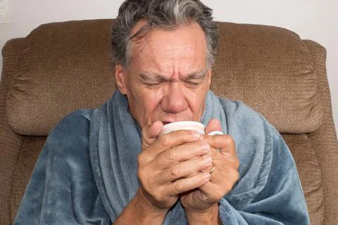 Mature Man Drinking Tea Stock Photos