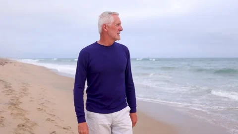 Mature Man Exercising At The  Beach Stock-Footage 201165076