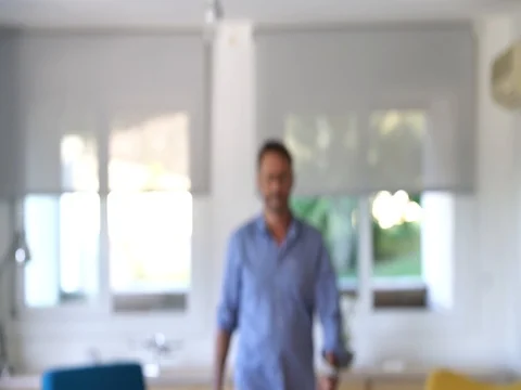 Mature man with eyeglasses walking to camera Stock Footage 80444777