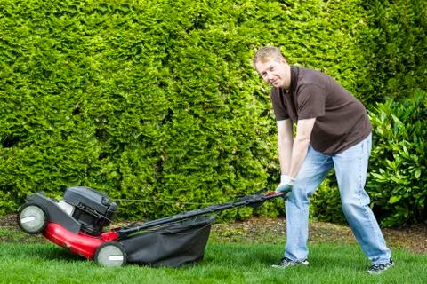 Mature man getting ready to do yard work Stock Photos