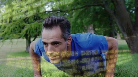Mature man performing pushups on grass camera starting low panning up, fitness Stock Footage 332577856