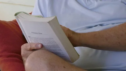 Mature Man Reading A Book Stock Footage